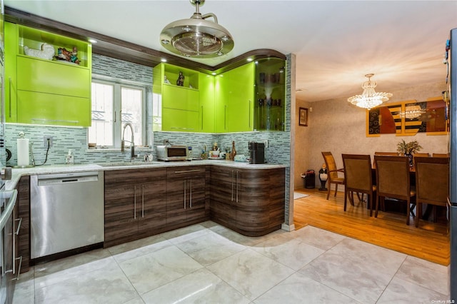 110-17 64th Ave, Forest Hills, NY 11375 - kitchen featuring stainless steel dishwasher, a chandelier, decorative backsplash, and hanging light fixtures