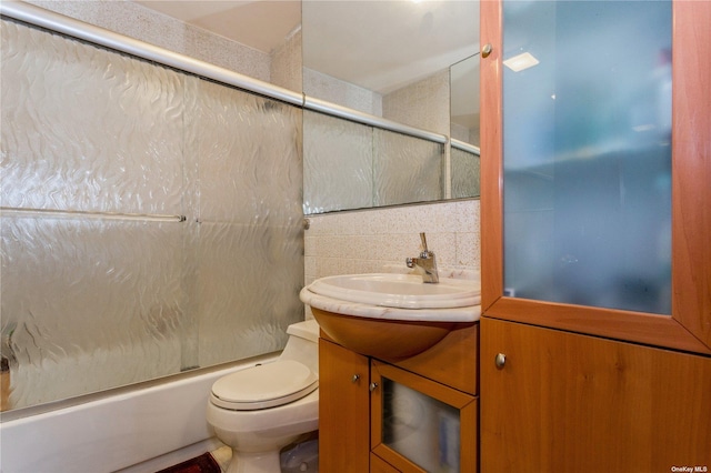110-17 64th Ave, Forest Hills, NY 11375 - bathroom with vanity, enclosed tub / shower combo, tile walls, and backsplash