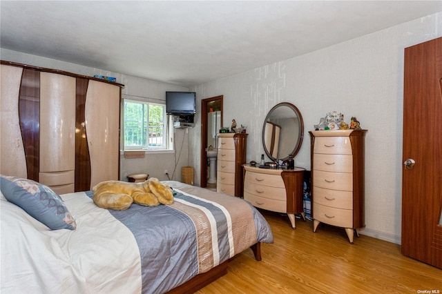 110-17 64th Ave, Forest Hills, NY 11375 - bedroom featuring light wood-style floors