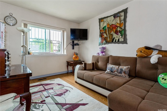 110-17 64th Ave, Forest Hills, NY 11375 - living room with wood finished floors and baseboards