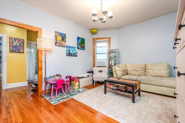 51-17 47th St Unit 2, Woodside, NY 11377 - living room featuring a chandelier and wood finished floors