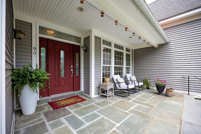 90 River Rd, Hyde Park, NY 12538 - doorway to property featuring a porch and a shingled roof