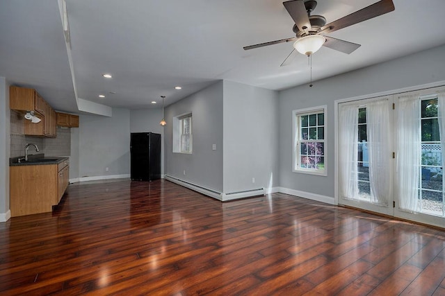 90 River Rd, Hyde Park, NY 12538 - unfurnished living room with a baseboard radiator, dark wood finished floors, a ceiling fan, and recessed lighting