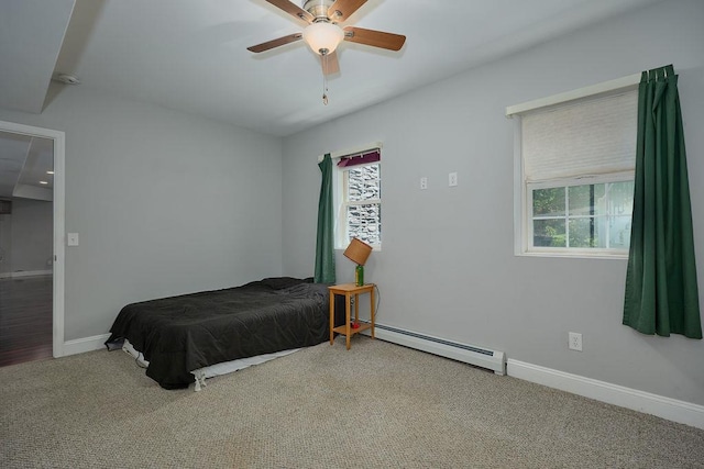 90 River Rd, Hyde Park, NY 12538 - bedroom featuring a baseboard radiator, carpet floors, and ceiling fan