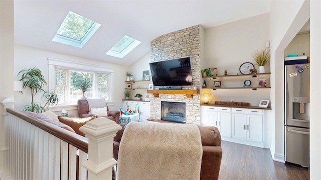114 Shetland Dr, New City, NY 10956 - living room with dark wood-style floors, a fireplace, vaulted ceiling, and a skylight