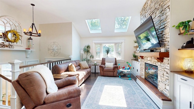 114 Shetland Dr, New City, NY 10956 - living room featuring a fireplace, wood finished floors, and a skylight