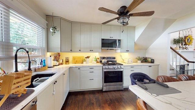 114 Shetland Dr, New City, NY 10956 - kitchen with stainless steel appliances, a ceiling fan, dark wood finished floors, white cabinetry, and light stone countertops