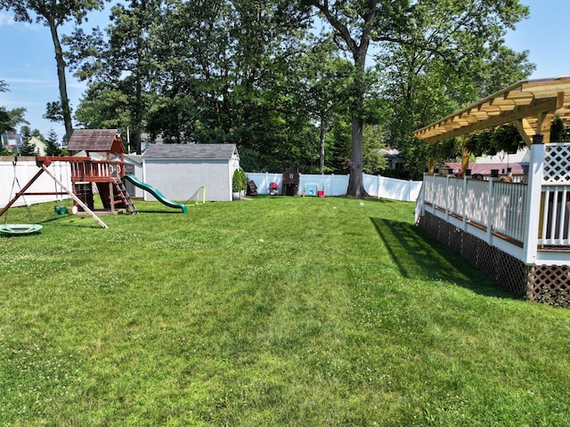114 Shetland Dr, New City, NY 10956 - fenced backyard featuring a playground and a pergola