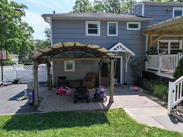 114 Shetland Dr, New City, NY 10956 - back of house featuring a patio, a gazebo, and a gate