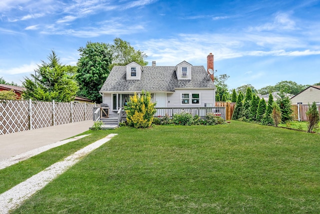 299 Orchid Dr, Mastic Beach, NY 11951 - new england style home featuring a chimney, a shingled roof, and a wooden deck