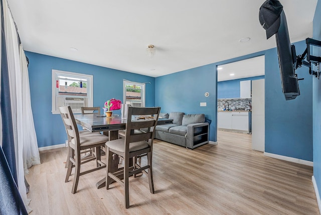 299 Orchid Dr, Mastic Beach, NY 11951 - dining room featuring light wood-style flooring, cooling unit, and recessed lighting