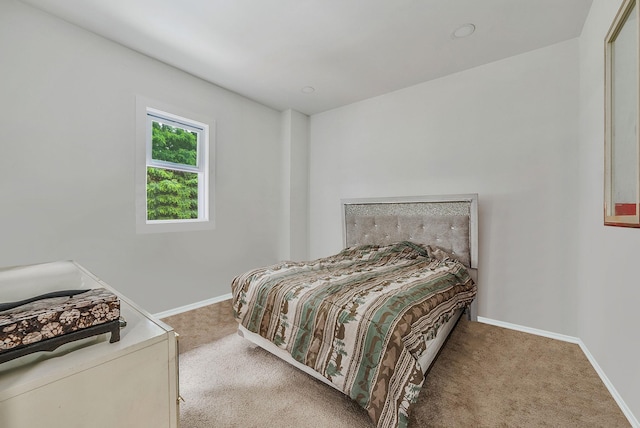 299 Orchid Dr, Mastic Beach, NY 11951 - bedroom featuring carpet flooring