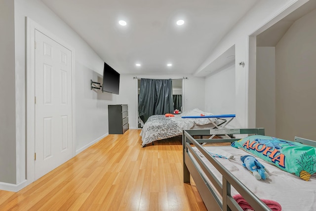 299 Orchid Dr, Mastic Beach, NY 11951 - bedroom with recessed lighting and light wood-style flooring