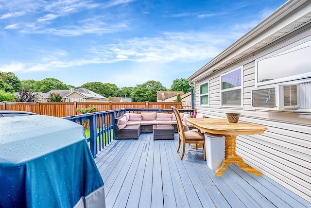 299 Orchid Dr, Mastic Beach, NY 11951 - deck with outdoor lounge area, a fenced backyard, grilling area, cooling unit, and outdoor dining area