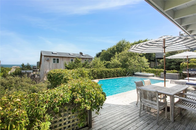 230 Bay Walk, Fire Island Pines, NY 11782 - outdoor pool featuring a jacuzzi, a deck, and outdoor dining area