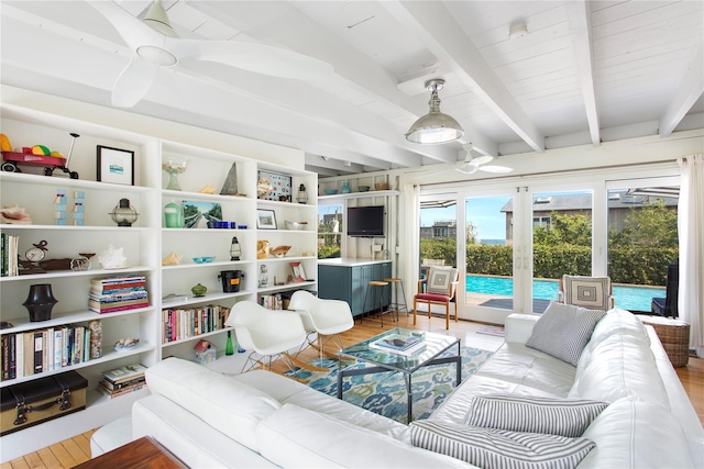 230 Bay Walk, Fire Island Pines, NY 11782 - living room featuring a ceiling fan, beamed ceiling, light wood finished floors, and french doors