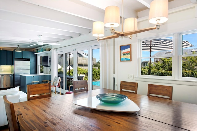 230 Bay Walk, Fire Island Pines, NY 11782 - dining area featuring healthy amount of natural light, beam ceiling, a ceiling fan, and wood finished floors
