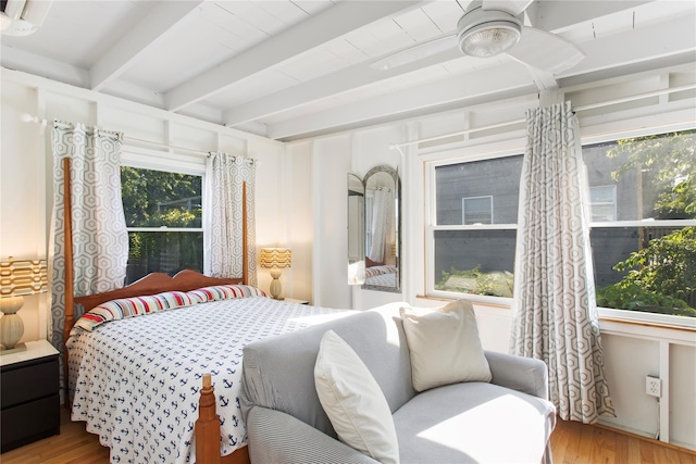 230 Bay Walk, Fire Island Pines, NY 11782 - bedroom with wood finished floors, multiple windows, and beam ceiling