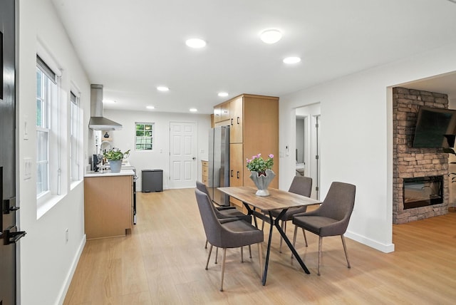 7 Fayer Ct, Phillipsport, NY 12790 - dining space featuring light wood-style floors, a fireplace, and recessed lighting