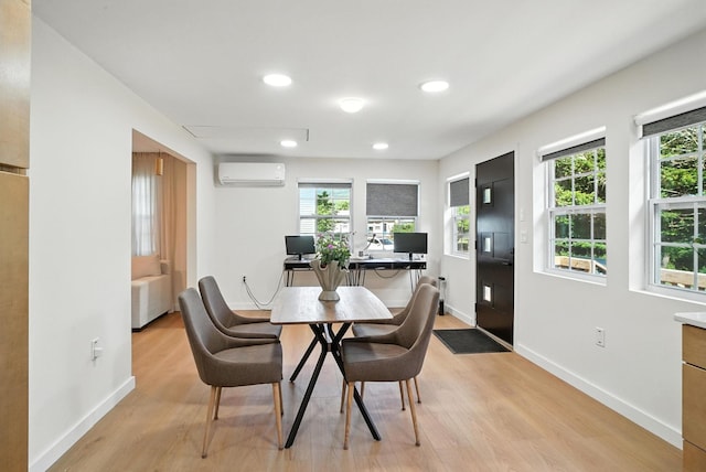 7 Fayer Ct, Phillipsport, NY 12790 - dining area featuring a wall mounted AC, light wood finished floors, recessed lighting, and a desk