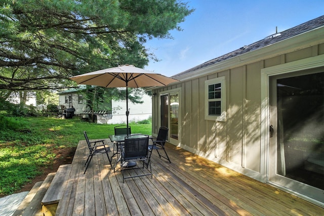 7 Fayer Ct, Phillipsport, NY 12790 - wooden deck with outdoor dining space and a yard