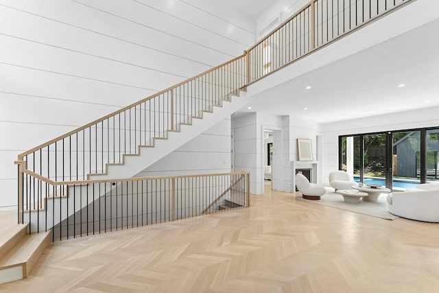 7 Rosemary Ln, Sag Harbor, NY 11963 - stairs featuring a towering ceiling and recessed lighting