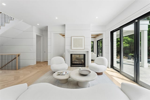 7 Rosemary Ln, Sag Harbor, NY 11963 - living area with a fireplace, stairs, and recessed lighting