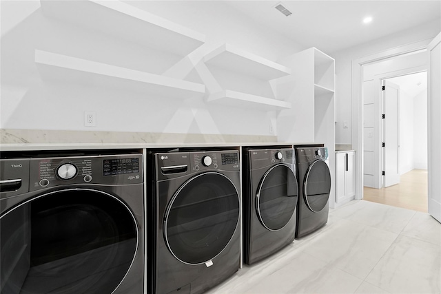 7 Rosemary Ln, Sag Harbor, NY 11963 - laundry area with washing machine and clothes dryer