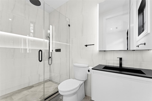 7 Rosemary Ln, Sag Harbor, NY 11963 - bathroom featuring a stall shower, vanity, and tile walls