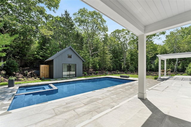 7 Rosemary Ln, Sag Harbor, NY 11963 - view of pool with an outdoor structure, a patio area, a storage structure, and a pool with connected hot tub