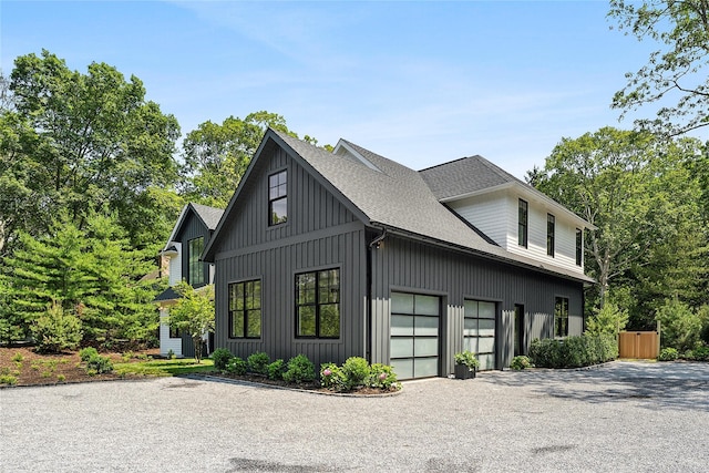 7 Rosemary Ln, Sag Harbor, NY 11963 - view of property exterior with driveway, board and batten siding, and roof with shingles