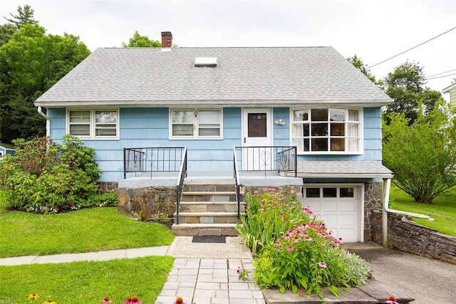 511 Walnut St, Hurley, NY 12443 - view of front of property with a shingled roof, a garage, a chimney, asphalt driveway, and a front lawn