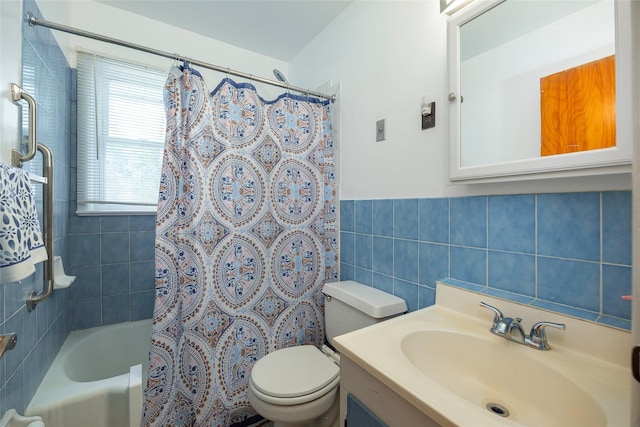 511 Walnut St, Hurley, NY 12443 - bathroom with tile walls, vanity, shower / bathtub combination with curtain, and wainscoting