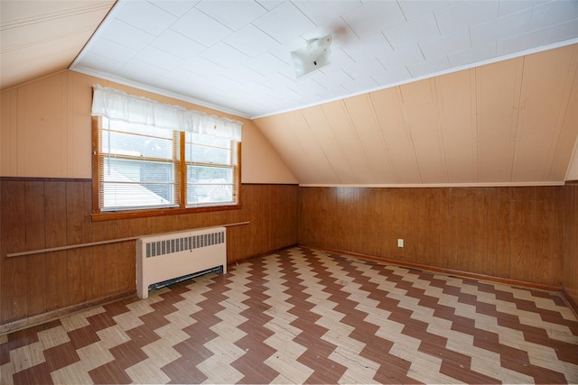511 Walnut St, Hurley, NY 12443 - additional living space featuring wooden walls, radiator, lofted ceiling, and wainscoting
