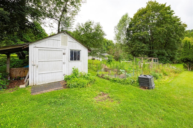 511 Walnut St, Hurley, NY 12443 - view of shed with a vegetable garden