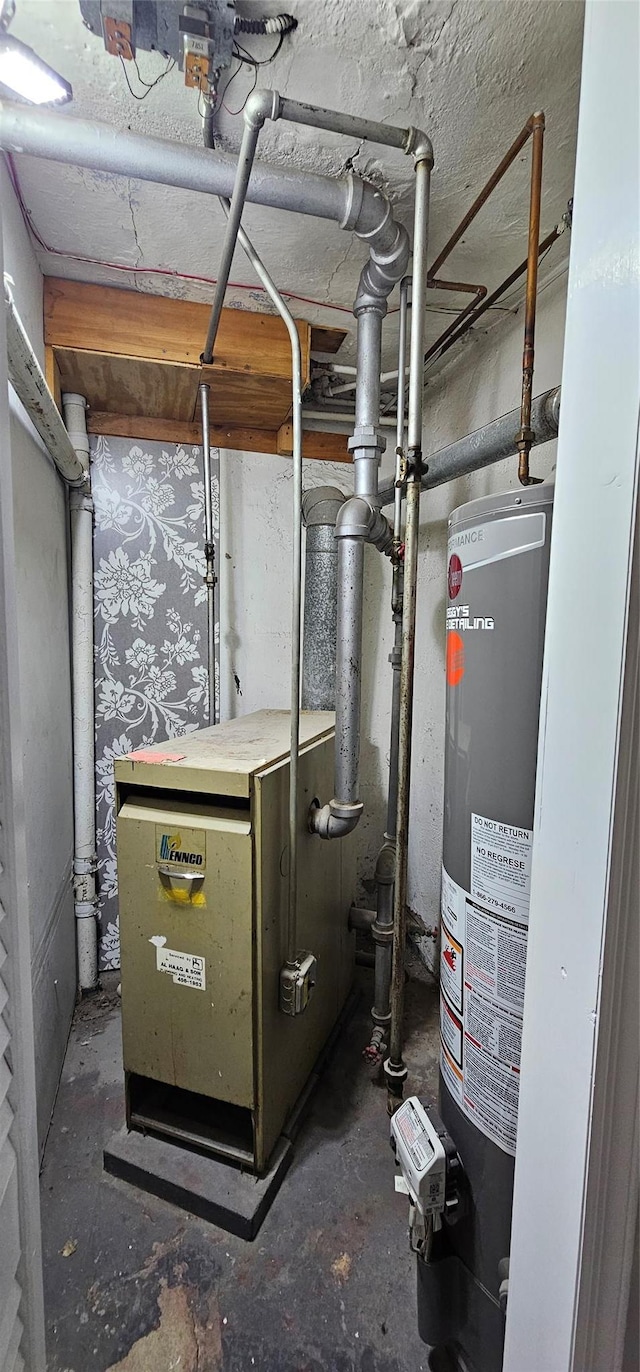 5203 72nd Pl, Maspeth, NY 11378 - utility room with water heater