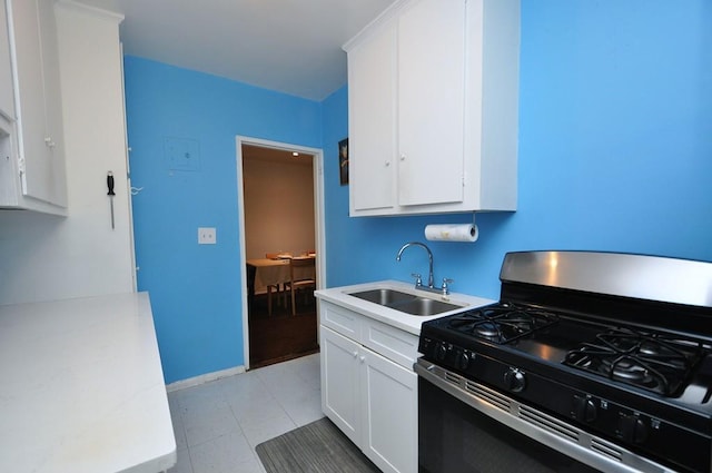 29 Abeel St Unit 4L, Yonkers, NY 10705 - kitchen featuring gas range oven, white cabinetry, and light countertops