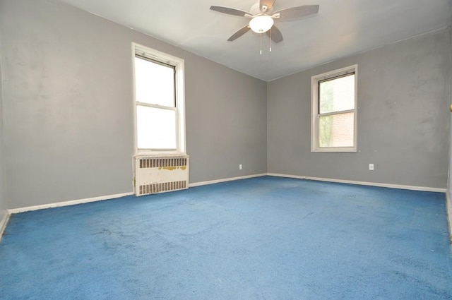 29 Abeel St Unit 4L, Yonkers, NY 10705 - carpeted empty room with radiator heating unit and a ceiling fan