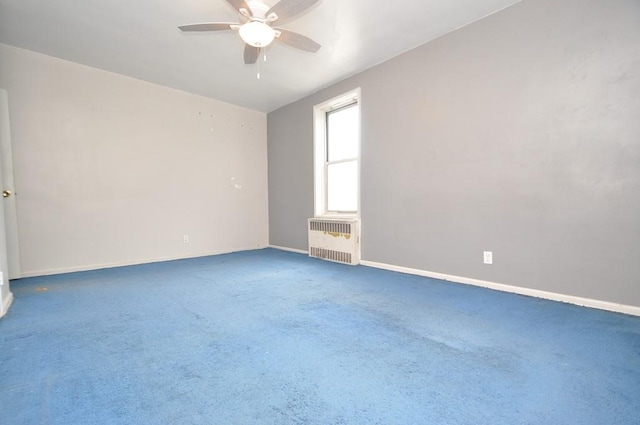 29 Abeel St Unit 4L, Yonkers, NY 10705 - empty room with radiator, ceiling fan, and carpet floors