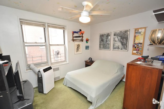 29 Abeel St Unit 4L, Yonkers, NY 10705 - bedroom featuring light colored carpet, radiator, and ceiling fan
