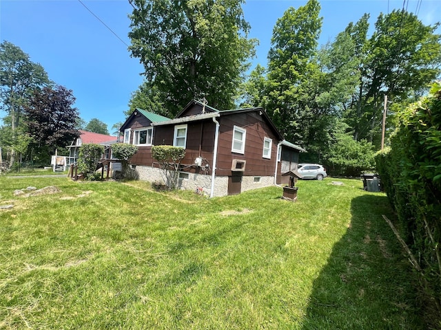 71 Keller Ave, Smallwood, NY 12778 - view of side of home with a lawn and crawl space