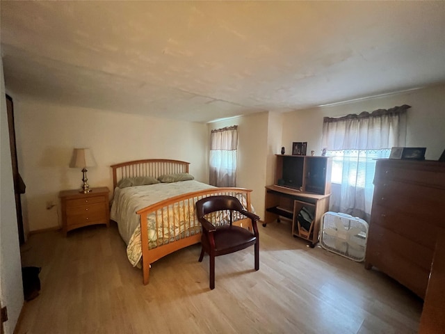 71 Keller Ave, Smallwood, NY 12778 - bedroom with multiple windows and wood finished floors