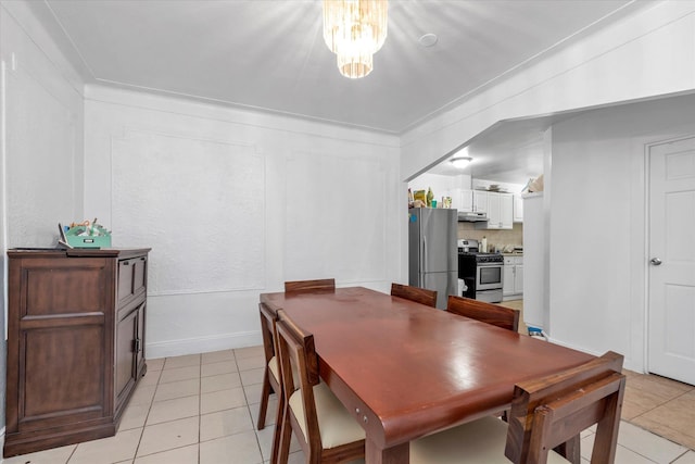32-17 110, East Elmhurst, NY 11369 - dining area featuring light tile patterned flooring and a chandelier