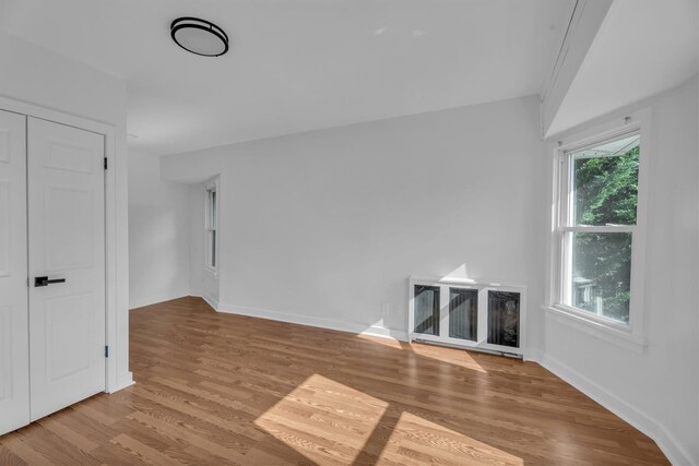 643 Deer Park Ave, Babylon, NY 11702 - unfurnished living room featuring wood finished floors