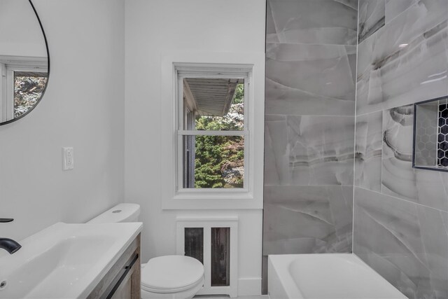 643 Deer Park Ave, Babylon, NY 11702 - full bathroom featuring vanity, plenty of natural light, and tub / shower combination