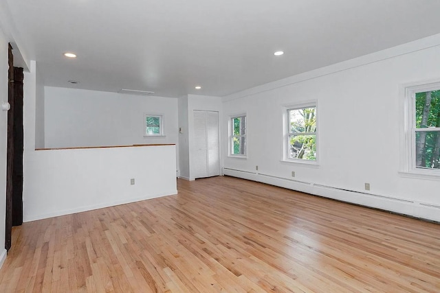 5 Jefferson St, Poughkeepsie, NY 12601 - unfurnished room with light wood-style flooring, healthy amount of natural light, baseboard heating, and recessed lighting