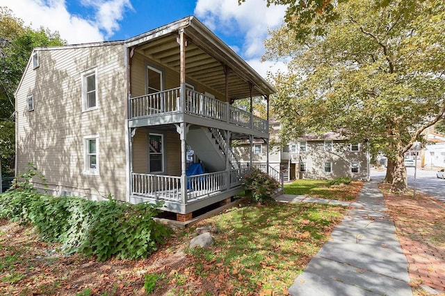 5 Jefferson St, Poughkeepsie, NY 12601 - view of home's exterior with stairway and a wooden deck