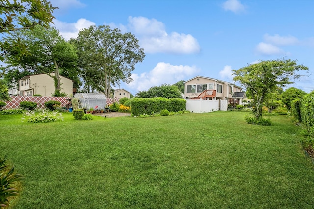 24 Hickory St, Deer Park, NY 11729 - view of yard with an exterior structure and an outbuilding