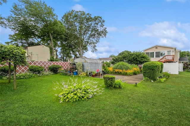 24 Hickory St, Deer Park, NY 11729 - view of yard featuring a greenhouse and an outbuilding