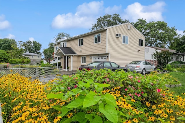 24 Hickory St, Deer Park, NY 11729 - view of front facade featuring a garage